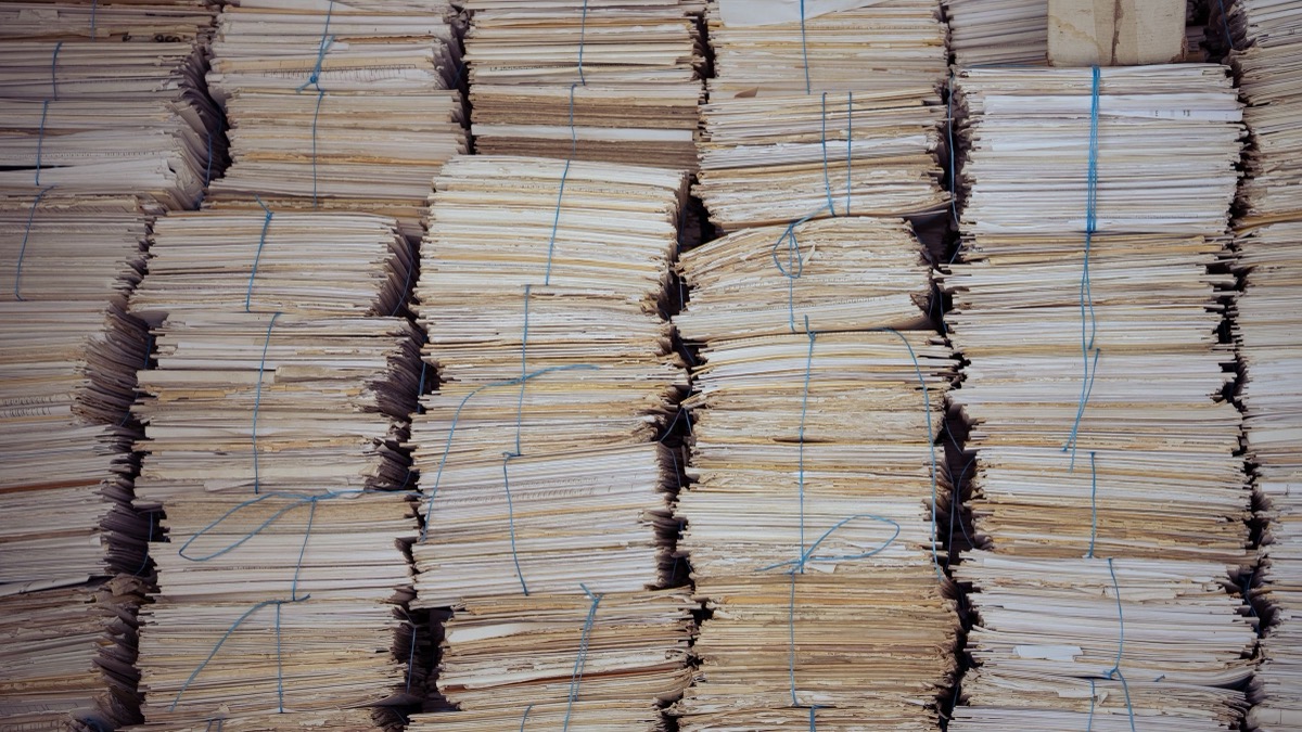 Stacks of bound paper bundles in an archive