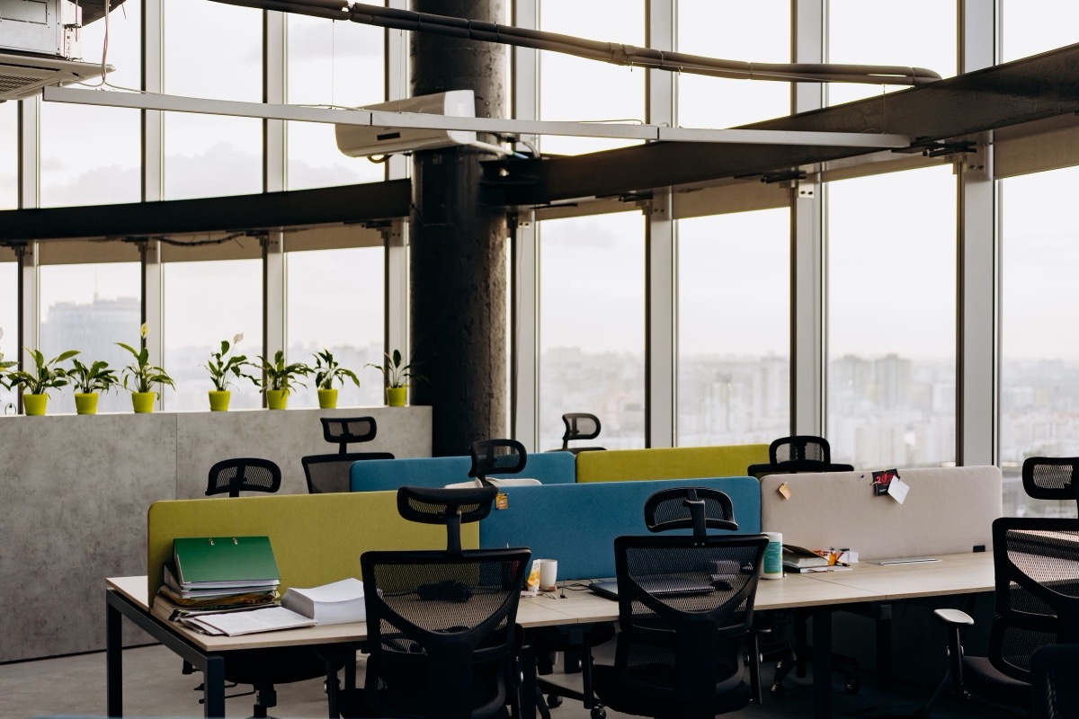 An open-plan office with desks and chairs