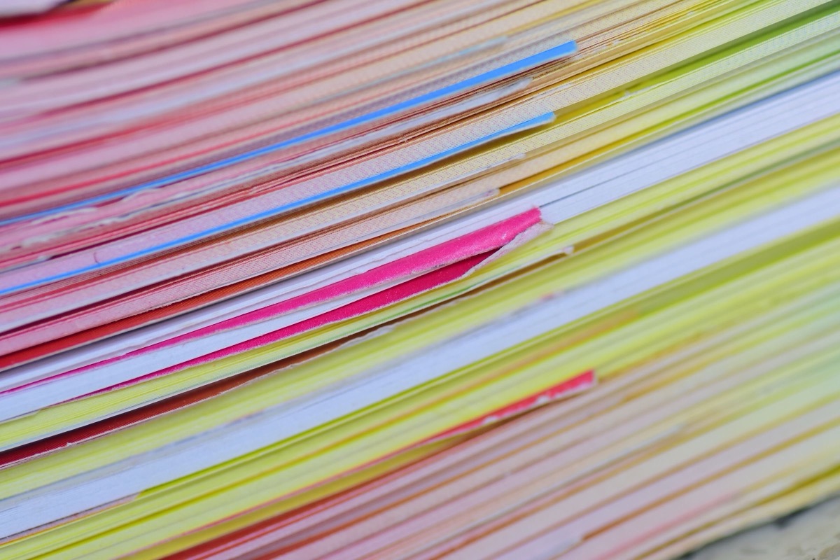 A stack of coloured paper sheets