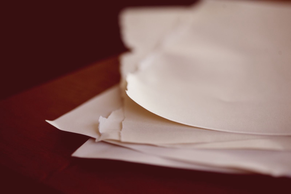 Stacked papers on a desk